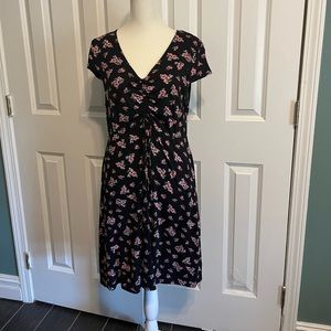 Black floral dress with pink flowers and cap sleeves